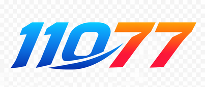 11077